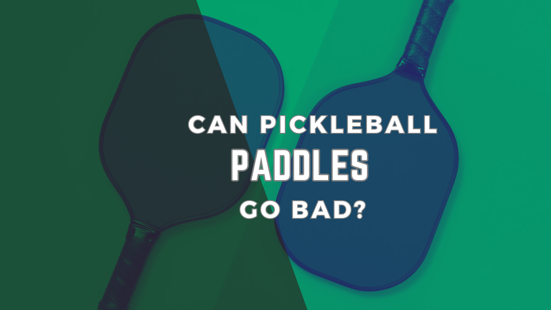 Can Pickleball Paddles Go Bad? 2 black paddles on a pickleball court.